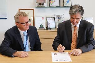 Chief Executive and Leader signing the Race at Work Charter - 19 August 2021