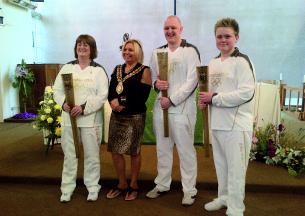 Heritage Photo of Basildon - 2012 - Olympic Torch bearers George, Tricia and Marc with Mayor Mo Larkin at Basildon's Olympic celebration in St Martins Church