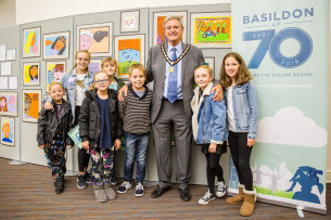 Images showing a photo of Basildon Arts Week Exhibition with Deputy Mayor of Basildon